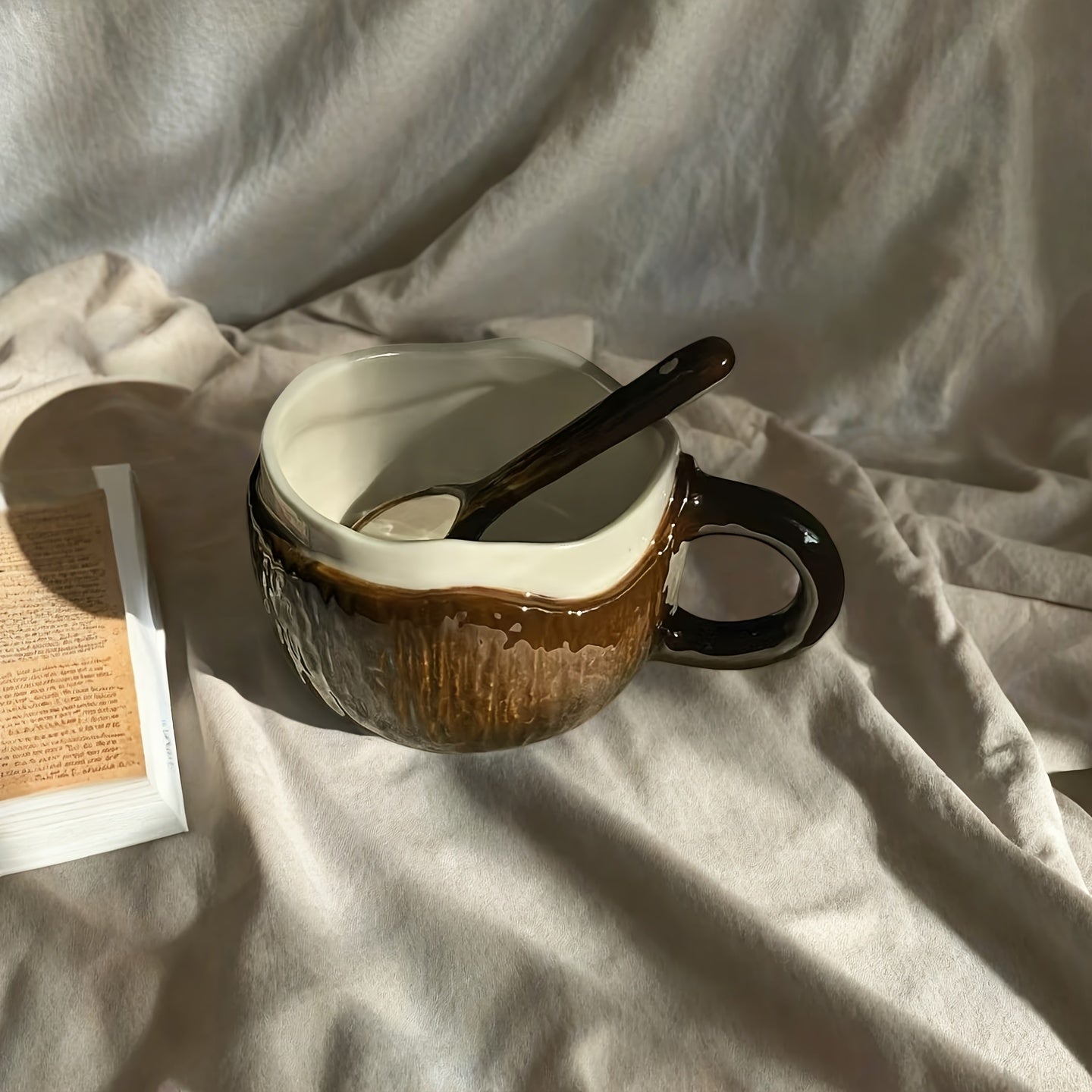 A Ceramic Coffee Mug Designed Like a Coconut Shell, Complete with a Spoon. This Novelty Tropical Mug Is Perfect for Afternoon Tea, Yogurt, And Fruit. It Is Safe for Both The Dishwasher And Microwave