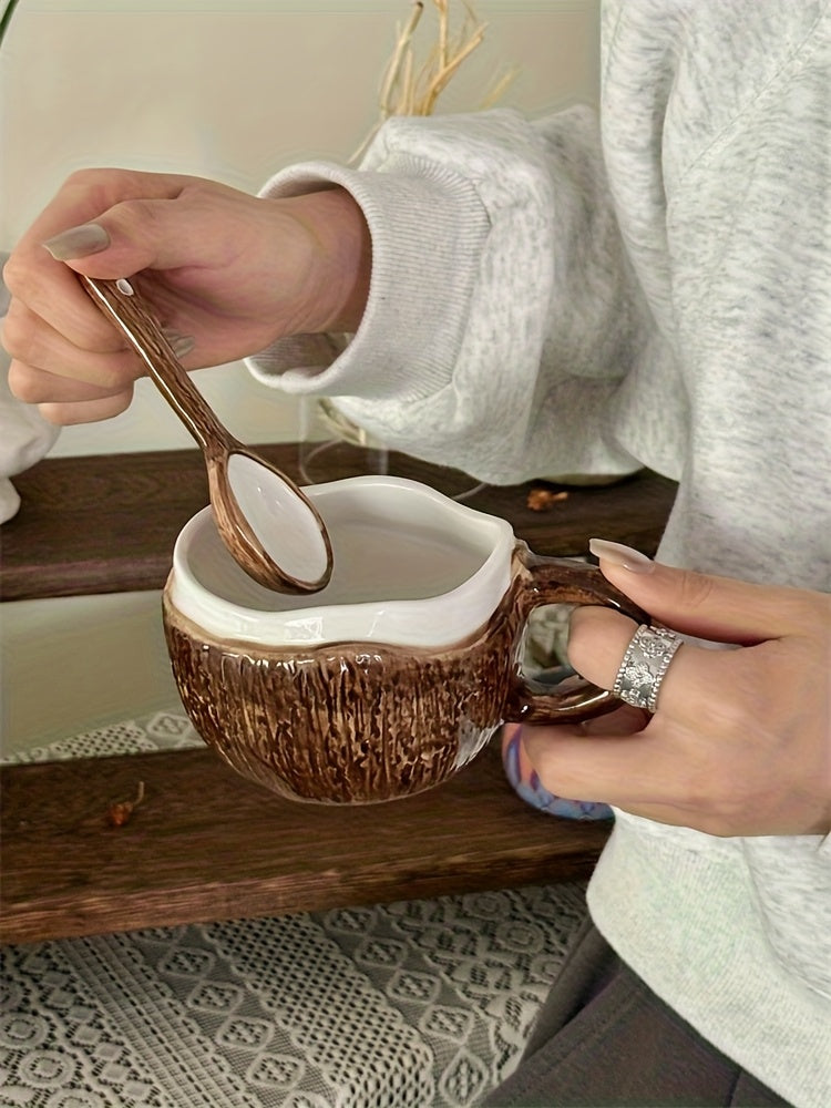 A Ceramic Coffee Mug Designed Like a Coconut Shell, Complete with a Spoon. This Novelty Tropical Mug Is Perfect for Afternoon Tea, Yogurt, And Fruit. It Is Safe for Both The Dishwasher And Microwave